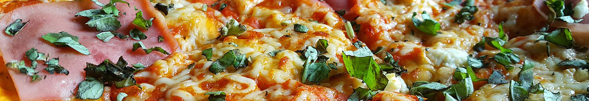 Eating Pizza at VIP Pizza restaurant in Exeter, CA.